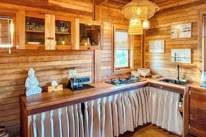 Maison Confort, vue mer | Cuisine privée | Bouilloire électrique, chaise haute