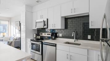 Fridge, stovetop, cookware/dishes/utensils