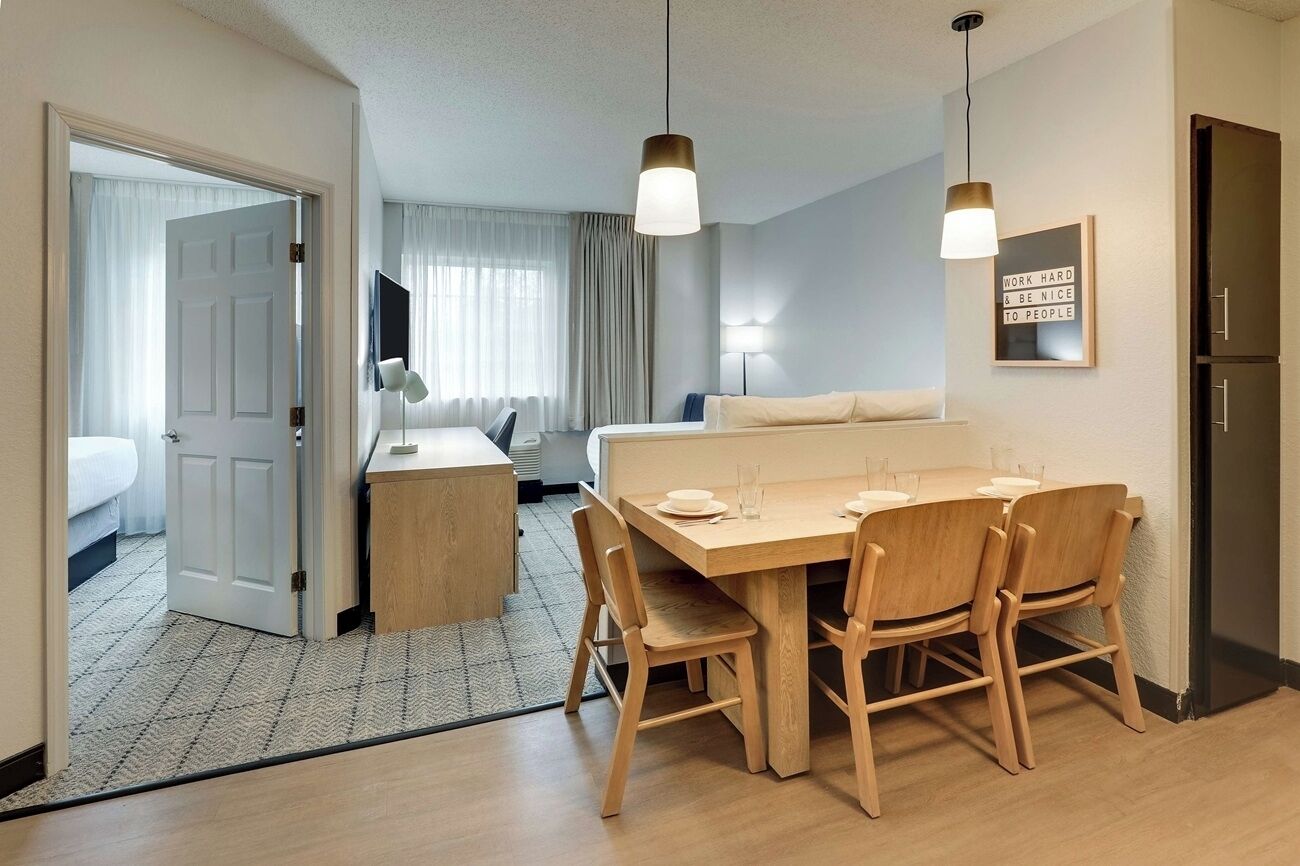 Step into an airy suite with space to dine together.