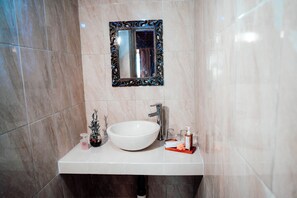 Shower, free toiletries, towels, soap