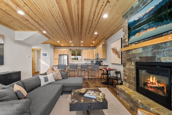 Living Rm w Cozy Fireplace, sectional, smart TV, fully equipped kitchen