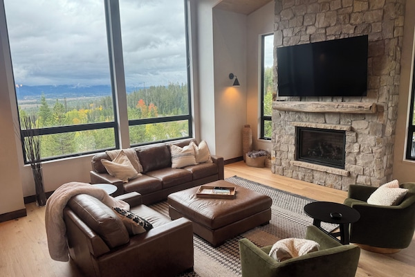 The large and spacious great room offers stunning East , South and West views.