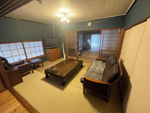 A large kitchen and room for children to play, this house is recommended for families.