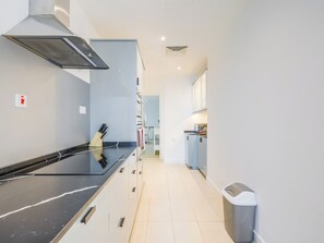 Appartement Deluxe, balcon, vue sur la ville | Cuisine privée | Cafétière à espresso, bouilloire électrique