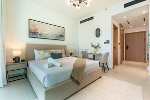 1 chambre, coffre-fort, fer et planche à repasser
