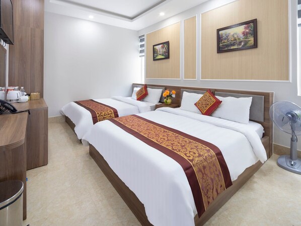 Standard Quadruple Room, City View | Desk, laptop workspace, free WiFi