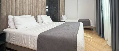 Deluxe Triple Room, Balcony | Premium bedding, down duvets, Tempur-Pedic beds, in-room safe