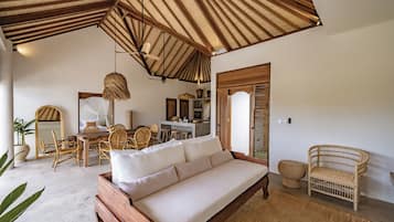 Deluxe Villa, Patio, Pool View | Living area | 42-inch flat-screen TV with cable channels