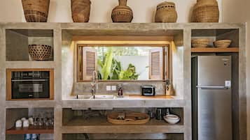 Deluxe Villa, Patio, Pool View | Private kitchen | Fridge, oven, stovetop, cookware/dishes/utensils