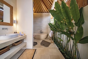 Deluxe Villa, Patio, Pool View | Bathroom | Free toiletries, hair dryer, bidet, towels