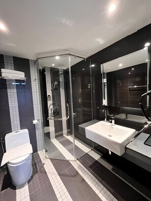Shower, towels, soap, shampoo