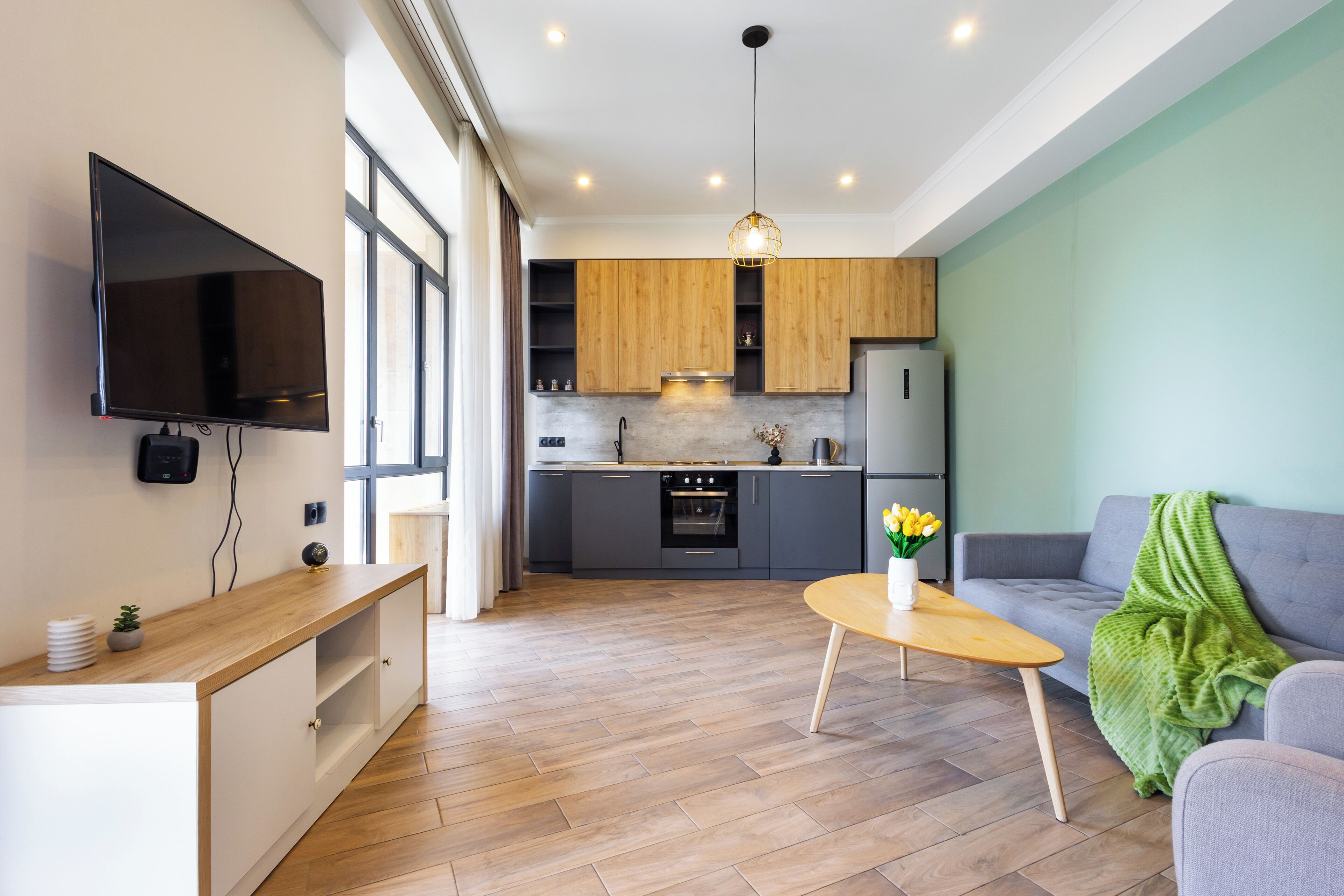 Classic Apartment, Balcony | Living area | 50-inch flat-screen TV with cable channels