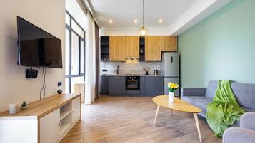 Apartamento clásico, balcón | Zona de estar