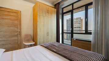 Basic Apartment, Balcony, City View | Laptop workspace, blackout drapes, iron/ironing board, free WiFi