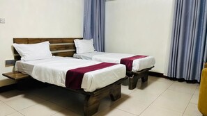 Deluxe Twin Room, Balcony, City View | Egyptian cotton sheets, premium bedding, down comforters - ROYAL CROWN HOTEL  (Kigali)