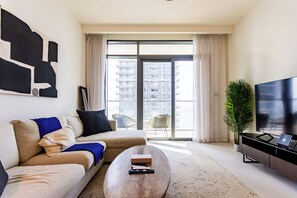 Deluxe Apartment, Balcony, Sea View | Living area