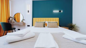 1 bedroom, desk, iron/ironing board, travel crib