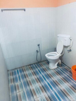 Standard Double Room, Garden View | Bathroom | Combined shower/tub, towels, soap - Blue Bird Residency Neil Island (Port Blair)