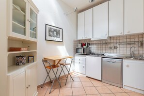 Apartment, 2 Bedrooms | Private kitchen | Fridge, microwave, stovetop, dishwasher
