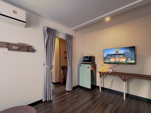 Deluxe Triple Room, Private Bathroom, City View | Desk, laptop workspace, free WiFi