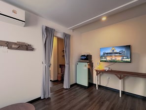 Deluxe Triple Room, Private Bathroom, City View | Desk, laptop workspace, free WiFi