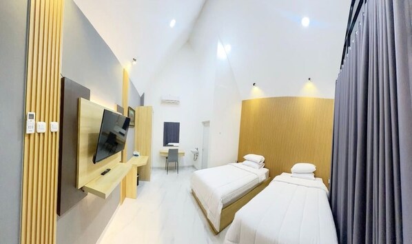 Habitació amb dos llits individuals estàndard, vistes al jardí | Wifi gratuïta 