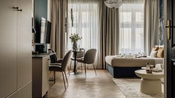 Comfort Room, City View | Desk, laptop workspace, iron/ironing board, free WiFi