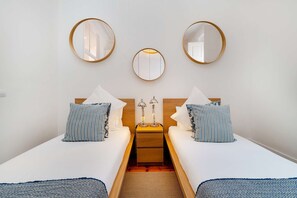 2 habitaciones, tabla de planchar con plancha, wifi y ropa de cama 