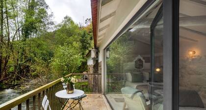 Riverfront Retreat with Exclusive Waterfall Views