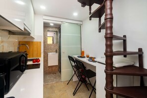 Microwave, stovetop, coffee/tea maker, toaster