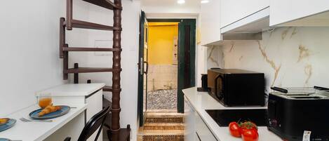 Microwave, stovetop, coffee/tea maker, toaster