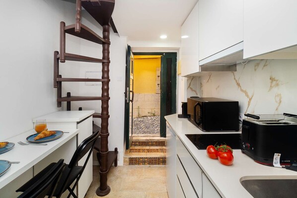 Microwave, stovetop, coffee/tea maker, toaster