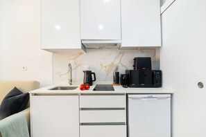 Microwave, stovetop, coffee/tea maker, toaster