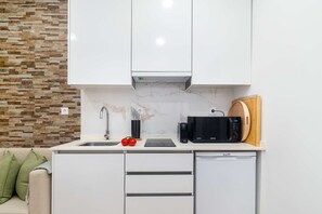 Microwave, stovetop, coffee/tea maker, toaster
