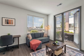 Apartment, 1 Bedroom | Living area | Smart TV, Netflix, Hulu, streaming services - CozySuites at AYR (Indianapolis)