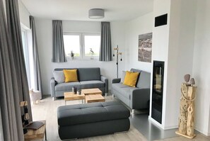 Téléviseur, foyer, livres, chaßne audio