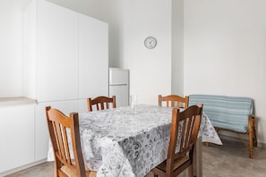 Apartment, 1 Bedroom, Balcony | Dining room - Via Franco Bolognese by Wonderful Italy (Bologna)