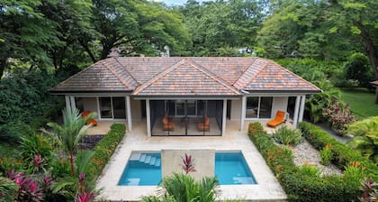 Beautiful Home in a Gated Neighborhood, Walking Distance to the Beach with Garden Views and a Pool