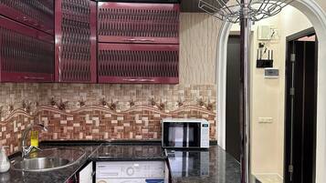 Economy appartement, balkon | Privékeuken