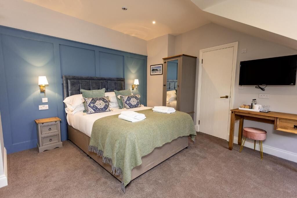 Chambre Deluxe, 1 très grand lit et 1 canapé-lit, vue ville