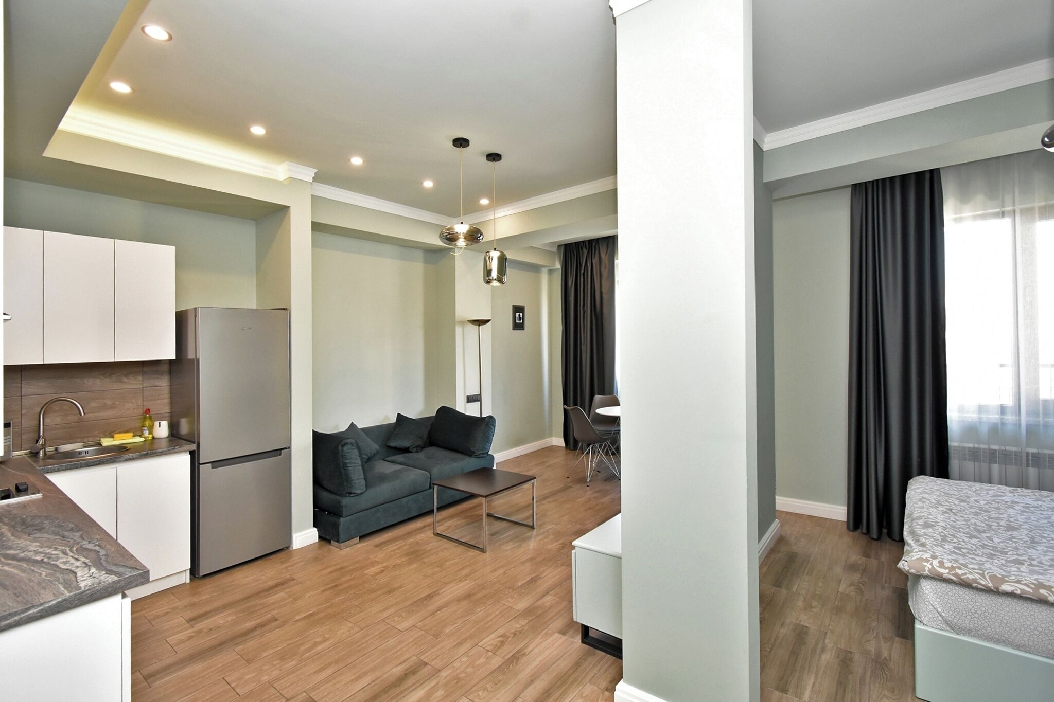 Apartemen Klasik, balkon, pemandangan kota | Area keluarga | Televisi layar datar 50-inci dengan saluran TV kabel