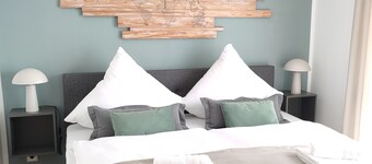 Modern semi-detached house with XXL parking space, bike storage and garden near Trier