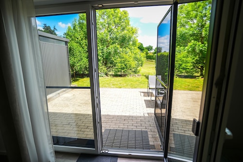 Modern semi-detached house with XXL parking space, bike storage and garden near Trier