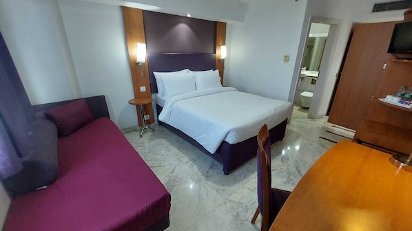 Chambre Deluxe Double ou avec lits jumeaux | Coffres-forts dans les chambres, fer et planche à repasser