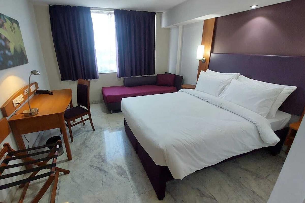 Chambre Deluxe Double ou avec lits jumeaux | Coffres-forts dans les chambres, fer et planche à repasser