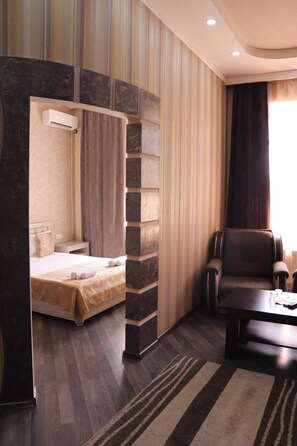 Deluxe Double Room, Courtyard View | Desk, laptop workspace, soundproofing, iron/ironing board - OLYMPIC HOTEL GYUMRI (Gyumri)