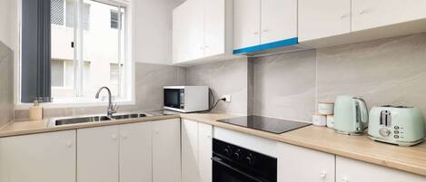 Fridge, microwave, oven, stovetop