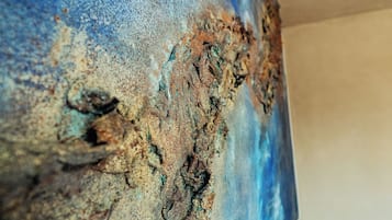 Deluxe Room, Sea View | Minibar, in-room safe, blackout drapes, soundproofing