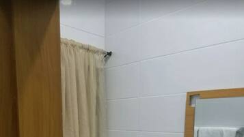 Shower, slippers, towels, soap