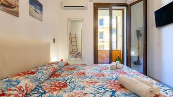 Een strijkplank/strijkijzer, wifi, beddengoed